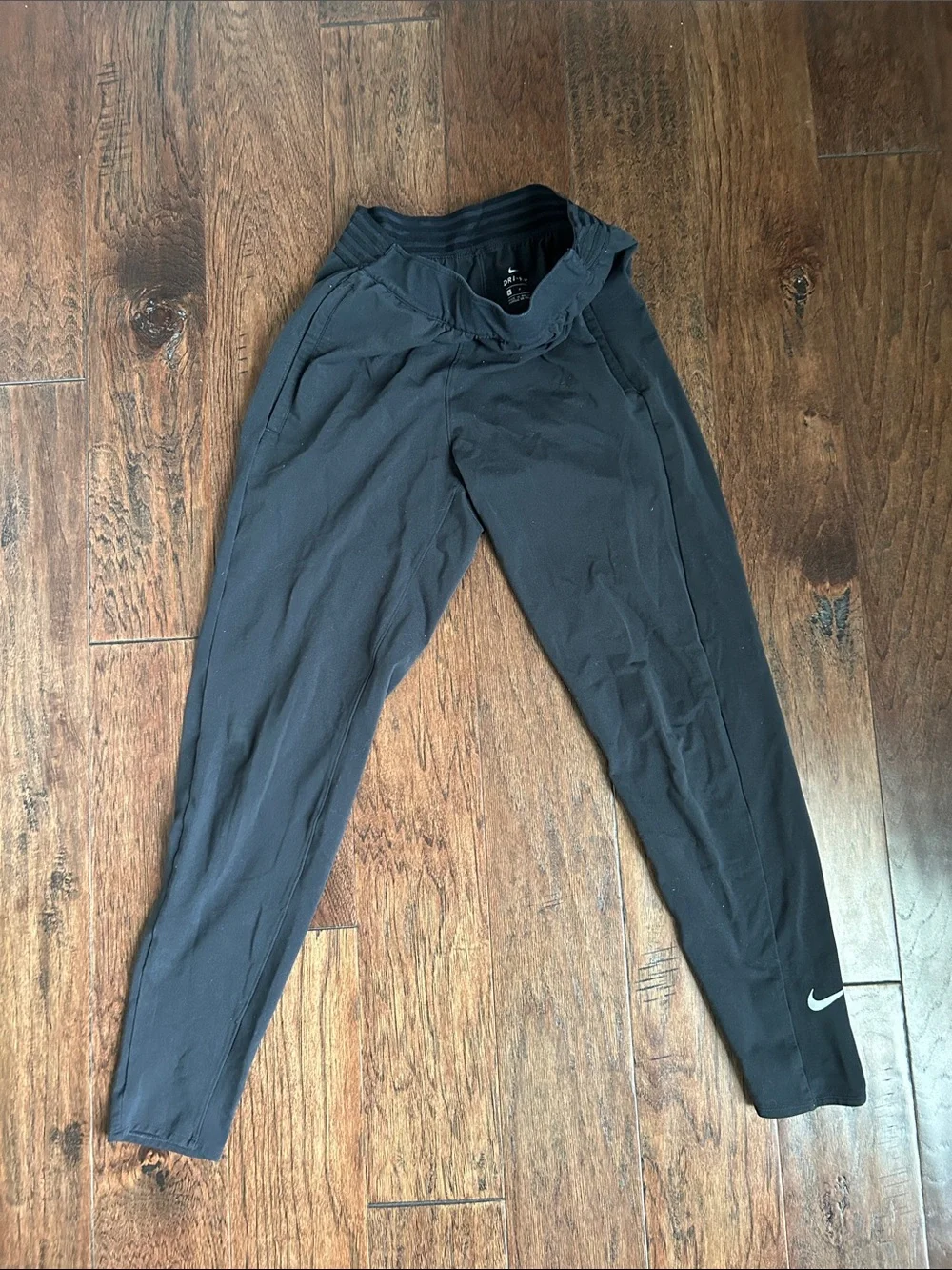 Nike Black women’s size S Performance Leggings with White Swoosh